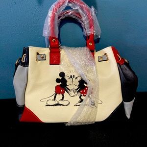 Brand New Disney Dooney and Burke